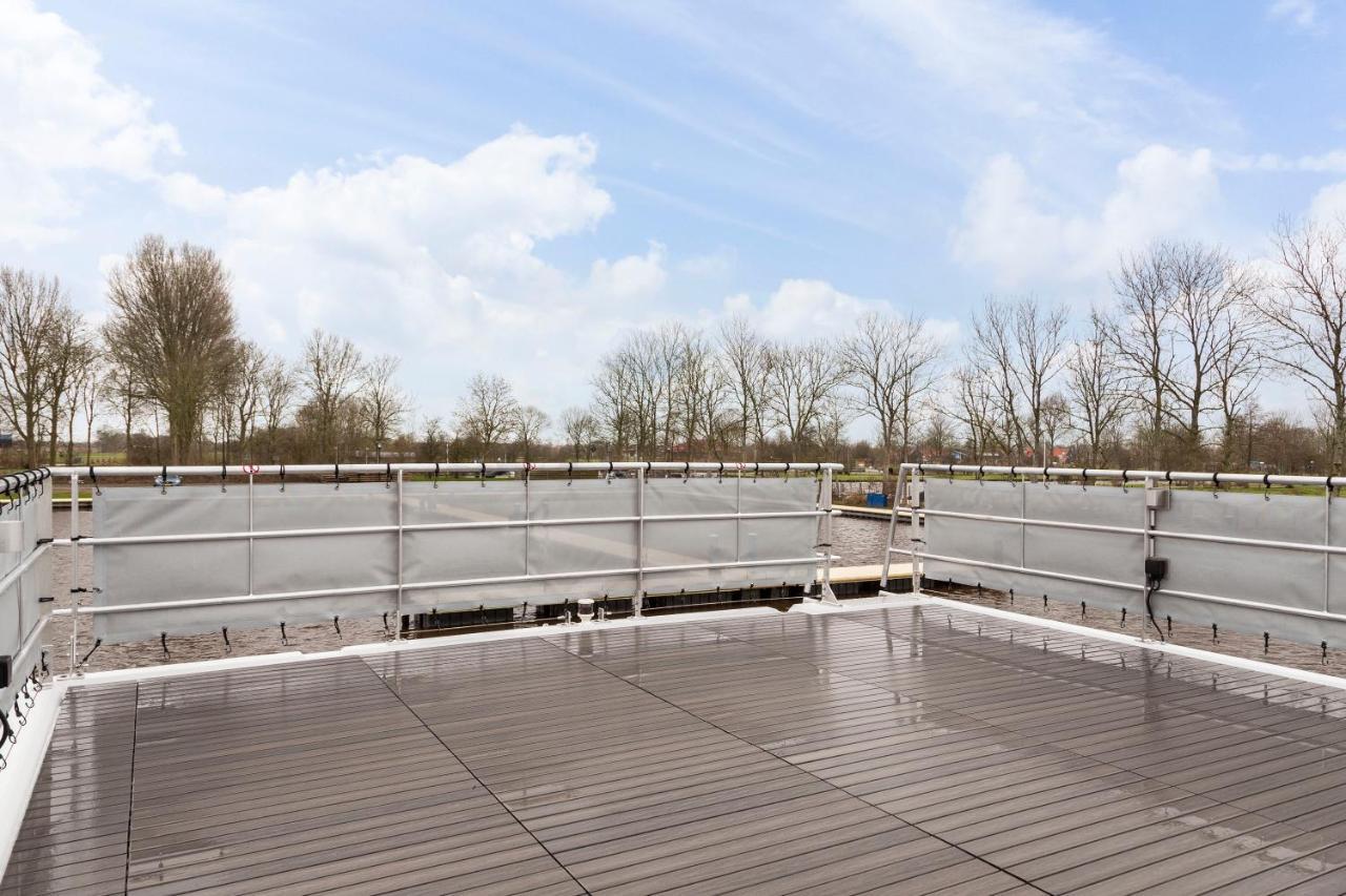 Welcome In - Houseboat 'Elysium' Met Eigen Aanlegsteiger Sneek - Offingawier 外观 照片